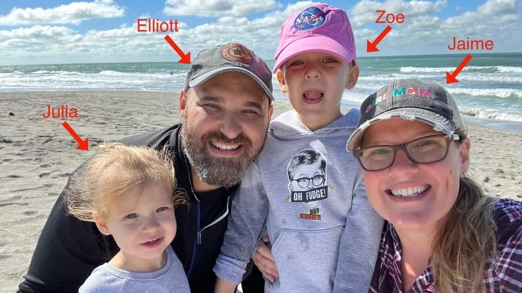 Elliott Natale with his wife Jaime and their daughters Julia and Zoe at the beach